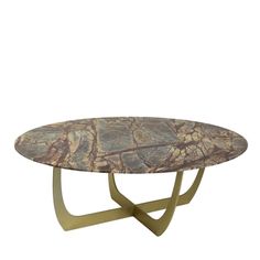 an oval marble table with gold metal legs