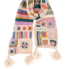 a multicolored knitted scarf with tassels