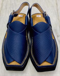 *Step out in style with these blue Peshawari chappals, the perfect addition to your wardrobe. These handmade leather sandals offer complete comfort and arch support with a unique and stylish design and a special sole for slip-resistance. *These traditional Peshawari chappals have been popular in Pakistan for years and are now gaining worldwide attention. Also known as Kheri chappal, Zalmi Peshawari chappal, Charsadda chappal, and Peshawari chappal-shoe, these men's blue sandals are completely ha Peshawari Chappal Men, Men Shoes Style, Best Sandals For Men, Mens Sandals Fashion, Blue Leather Sandals, African Shoes, Gents Shoes, Leather Slippers For Men, Casual Shoes For Men