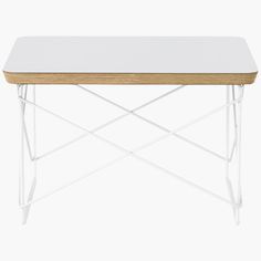 a white table with wooden top and metal legs