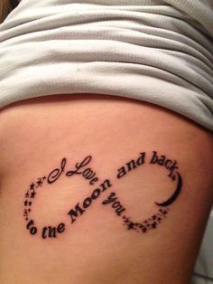 a woman with a tattoo on her stomach saying love and baby to the moon and back