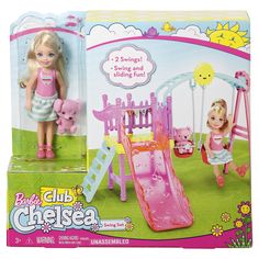 the doll is playing with her toy swing and slide set in its box for sale