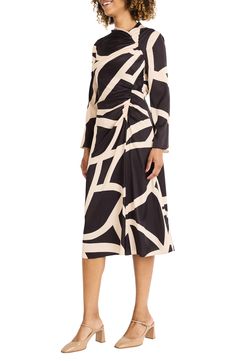 Side ruching creates the asymmetric silhouette of a contemporary long-sleeve dress in a bold geometric pattern. 47" length (size 8) Hidden back-zip closure Asymmetric neck Long sleeves Lined, except sleeves 97% polyester, 3% spandex Dry clean Imported Fitted Long Sleeve Midi Dress With Geometric Pattern, Long Sleeve Multicolor Abstract Print Dress, Fall V-neck Dresses With Abstract Print, Fall Abstract Print V-neck Dresses, Luxury V-neck Dress With Abstract Print, Asymmetric Dress, Maggy London, Black Sheath Dress, Dress Home