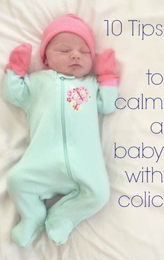 a baby laying on top of a bed with the words 10 tips to calm a baby with cold