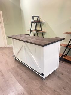 a kitchen island made out of an old barn door