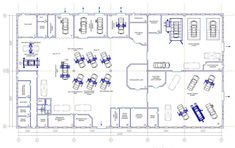 an office floor plan with several cars parked in it