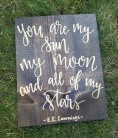 a wooden sign that says you are my sun, my moon and all of my stars