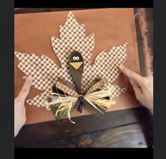 someone is making a turkey out of paper and some other things to make it look like an autumn leaf