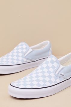 You'll reach for the Vans Classic Baby Blue & White Checkerboard Slip-On Sneakers time and time again when you want to create casually cool looks! These timeless sneakers have a sturdy canvas construction that creates a sleek silhouette with a rounded toe upper, elastic gussets at the sides, and a low-cut, padded collar. Iconic baby blue & white checkerboard design accents throughout. The effortless slip-on design makes these shoes essential when you have places to go and things to do! Logo tag Shoes Essential, Timeless Sneakers, Cool Looks, Blue Vans, Logo Tag, Vans Sneakers, Vans Classic, Flat Sneakers, Vans Shoes