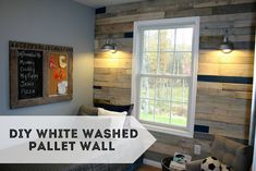 a bedroom with wooden walls and a soccer ball on the bed in front of it