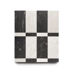 a black and white checkered marble tile