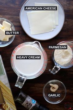 ingredients to make cheese sauce on a wooden table