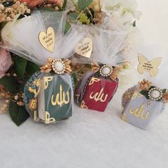 three small purses sitting next to each other on top of a snow covered ground