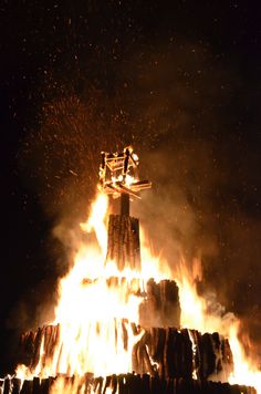 the skier is on top of the huge fire