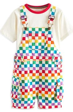 Rainbow hues checker these all-cotton short overalls fitted with roomy pockets and served with a perfectly matched ringer T-shirt. Adjustable buckle straps; side button closures Bib pocket; scoop pockets; cargo flap-patch pockets; back flap pockets 100% cotton Machine wash, tumble dry Imported Playful Cotton Shortalls With Pockets, Pastel Overalls, Rainbow Overalls, Playful Cotton Shortalls, Playful Multicolor Short Sleeve Onesie, Retro Rainbow Short Sleeve T-shirt, Playful Cotton T-shirt With Rainbow Print, Girl Suit, Short Overalls