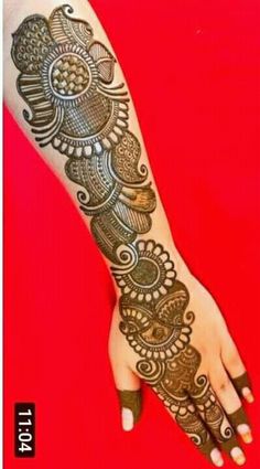 a henna tattoo is shown on someone's arm