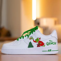 Get ready to steal the show with these fearless Custom Christmas Grinch Nike Air Force 1 Shoes! Designed to make a statement, these shoes combine festive cheer with daring style. With custom Grinch artwork and classic Nike comfort, these shoes are perfect for those who love to take risks and stand out from the crowd. 🔥 100% genuine, Brand New.👟 Custom sneakers.★Every pair is hand-made and unique.✨Best quality waterproof and scratch-proof paints used.🎉 1000+ satisfied customers across various Grinch Air Force 1, Grinch Shoes, Grinch Stuff, Grinch Hand, Custom Nike Air Force 1, Nike Custom, Custom Nike Air Force, Air Force 1 Shoes, Shoe Stretcher