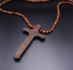 Elevate your style and showcase your faith with our stunning wooden cross necklaces for men. Crafted with meticulous attention to detail and using premium materials, our men's cross necklaces are the perfect combination of fashion and spirituality. Material: Top Quality Rosewood + Stainless Steel. Rosewood has a good influence on the human brain nervous system. Pendant size: 1.06"(27mm) X 1.58"(40mm) Adjustable 56cm-61cm/22"-24" length high quality stainless steel cross chain. WARNING: CHOKING H Wooden Cross Pendant, Wood Cross Necklace, Wood Anniversary Gifts, Wooden Cross Necklace, Wood Necklace Pendant, Pendants For Men, Cross Necklace For Men, Brown Leather Necklace, Cross Jewelry Necklace