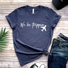 We Be Trippin Tshirt, Travel Sweater, Adventurous Vacay Tee, Vacation Gift, Family Vacation Tshirt, Vacay Mode Crewneck, Girls Trip Shirts How to Order?  1-Choose your t-shirt color, 2- Choose your size, 3- Select the quantity, 4- Click Add to Cart.  Production and shipping: * 100% airlume combed and ring-spun cotton, 32 singles 4.2 oz. * Solid colors are %100 cotton * Heathers are %52 cotton %48 polyester * Athletic Heather is combed and ring-spun cotton, 10% polyester * Seamless collar * Heat Vacation Tee Shirts, Family Vacation Tshirt, Funny Vacation Shirts, Funny Vacation, Travel Sweater, Vacation Tshirt