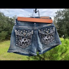 Platinum Plush Denim Shorts, Skull Detail On Back Pocket Embellished In Rhinestones. These Shorts Have Some Stretch In The Waist Band. Medium = 30" Waist. New With Tags. New With Tags, Platinum Plush Skullbling Shorts With Side Ties. Size Large Platinum Plush Rhinestone Shorts Skull Detail On Back Pocket Embellished In Rhinestones These Shorts Have Some Stretch In The Waist Band. S - 28" M - 30" L - 32" Xl - 34" 1x - 38" 2x - 40" 3x - 42" Rhinestone Shorts, Fits Clothes, Y2k Clothes, Fashion Fits, Back Pocket, Shorts With Pockets, Waist Band, On Back, Jean Shorts