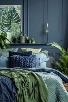 a bedroom with blue walls and green plants