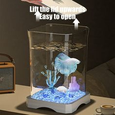 a fish in an aquarium is shown with the words life the hid upwards easy to open