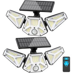 solar powered motion sensor security light with 4 lights and remote control for outdoor use in the garden or yard