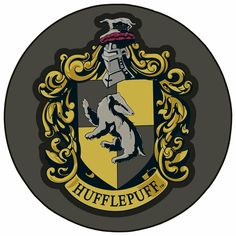 the hogwarts crest is shown on a black and yellow circular sticker that says,