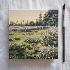 a painting of a field with wildflowers and trees in the background next to a brush