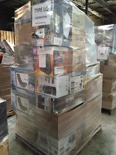 boxes stacked on top of each other in a warehouse