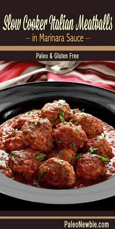 meatballs with sauce in a black bowl