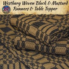 two brown and black bedspreads with text reading westbury woven black and mustard runners & table topper