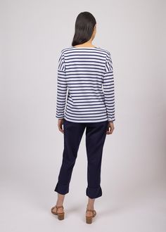 Elevate your French-girl game with this latest addition to our authentic Breton shirt collection! Tailored from our all-time best-seller shirt, MINQUIERS MODERNE, the MINQUIERS DROP features a more relaxed silouhette with dropped shoulders while maintaining the boyfriend fit and comfortable cotton we love. Made in Saint-James, Normandy, France. 100% lightweight cotton jersey. Navy Long Sleeve Marine Top, White Marine Style Long Sleeve Top, Marine Style Long Sleeve Cotton Tops, Navy Cotton Marine Style Tops, Navy Marine Style Cotton Top, White Sailor Style Long Sleeve Tops, White Marine Style Cotton Tops, Navy Cotton Nautical Tops, Marine Style Cotton Crew Neck Top