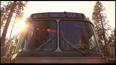 an old bus with the words almost famous tour t3 on it's side