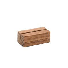 a small wooden block on a white background