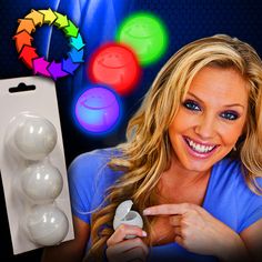 a woman pointing at three white balls in front of an ad for glow on the dark