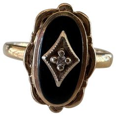 A single Old European-cut 0.02-carat diamond shines at the center of an oval-shaped onyx plaque in this antique ring, possibly Victorian-era (c. 1890-1900), handcrafted in 10K yellow gold. Stamped RESCO and 10K Onyx And Diamond Ring, Jewelry Goals, Antique Ring, Antique Diamond, Onyx Ring, Antique Rings, Victorian Era, Fashion Rings, Onyx