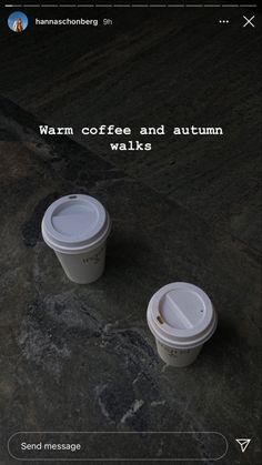 two coffee cups sitting next to each other on top of a stone slab with the caption warm coffee and autumn walks