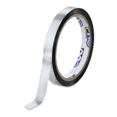 a roll of white tape with blue and black images on the side, against a white background