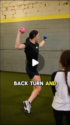 a woman holding two balls in her hands