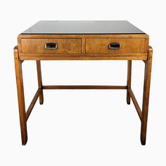 a wooden desk with two drawers on it's legs and one drawer open to show the