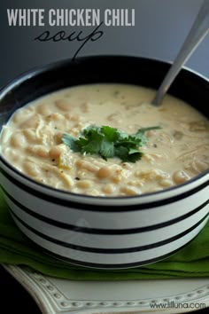 a bowl filled with soup and garnished with cilantro