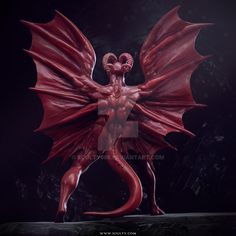 a red demon statue on a black background