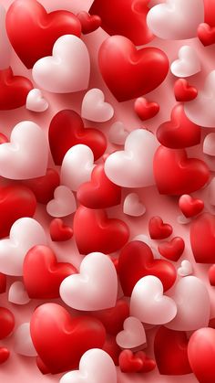 many red and white hearts floating in the air