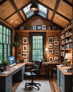 a home office with wood paneling and lots of windows