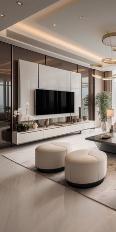 an elegant living room with white furniture and large flat screen tv mounted on the wall