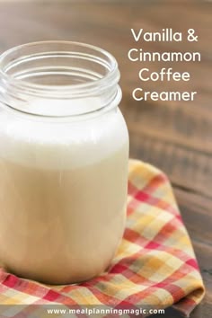 vanilla and cinnamon coffee creamer in a glass jar on a checkered napkin with text overlay