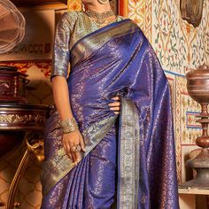 Violet colored saree is prettified with weaving work as shown which makes it appear classy. This saree is made of Kanjivaran Silk fabric which is accompanied with Kanjivaran Silk blouse piece which you can customise as per your design/style. Women can buy this saree to wear for their party, festive and functions, events and ideal for any fashionista. Note:- The actual product may differ slightly in color and design from the one illustrated in the images when compared with computer or mobile screen. Measurements: Saree : KanjiVaram : 5.5 Mtrs Blouse : KanjiVaram Silk : 0.8 Mtr Material: KanjiVaram Silk Stitch Type: Unstitched Country of Origin: India Care Guide: Dry Clean Designer Handloom Paithani Silk Pre-draped Saree, Designer Handloom Pre-draped Saree For Festivals, Diwali Pre-draped Saree With Zari Weaving, Self Design Pre-draped Saree For Navratri, Diwali Handloom Pre-draped Saree In Traditional Drape, Eid Designer Pre-draped Saree With Zari Weaving, Eid Designer Zari Weaving Pre-draped Saree, Banarasi Silk Pre-draped Saree With Zari Weaving, Semi-stitched Zari Weaving Saree