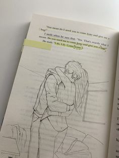 an open book with a drawing of a person