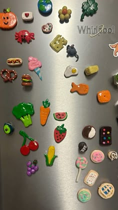 there are many different magnets on the refrigerator